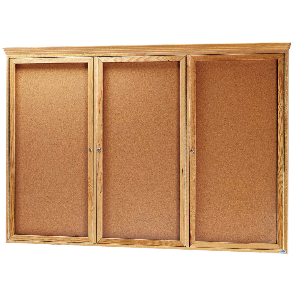 Aarco OBC4872RC 48" x 72" Enclosed Indoor Hinged Locking 3 Door Bulletin Board with Natural Oak Frame and Crown Molding