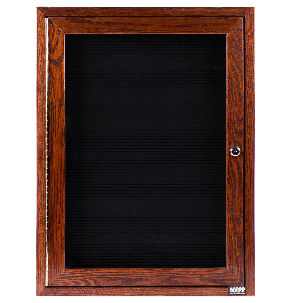 Aarco CDC2418 24" x 18" Enclosed Indoor Hinged Locking 1 Door Black Felt Message Board with Cherry Frame